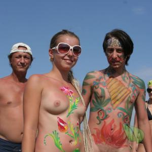 some co-ed nudists wearing fun bodypaint