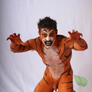 Solo male being bodypainted