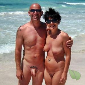 One nudists with cool tattoos in nature