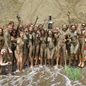 a crowd of nude person wearing a fun costume in the wilderness
