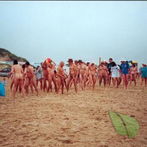 a bunch of nudists playing sports outside