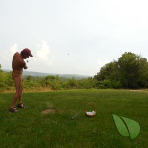 A nudist having fun outside
