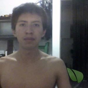 A male sitting at home