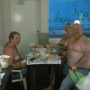 One nudist sitting at home