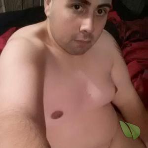 A nudist in their home