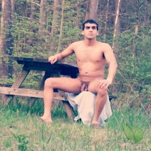 A male in the woods