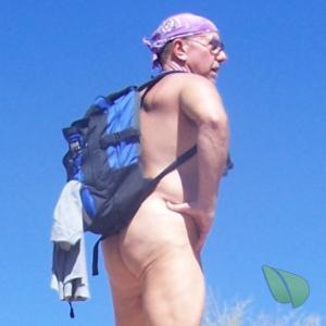 One nudist walking out and about