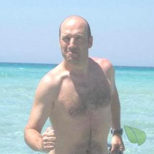 A nudist hanging out in the pool