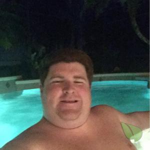 A dude relaxing in the pool