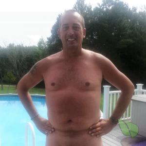 One guy relaxing in the water outside