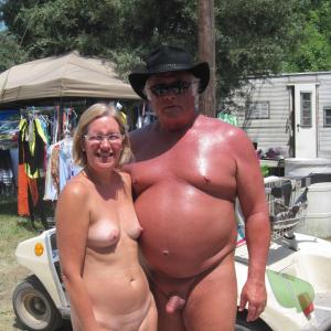One nudist couple outside