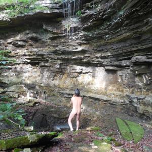 One male relaxing in the water in the wilderness