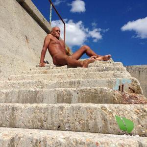 Solo nudist trekking in nature