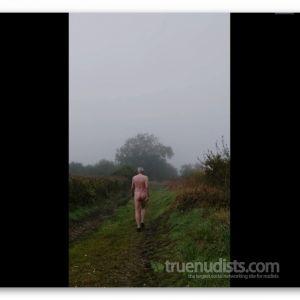 A male walking outside