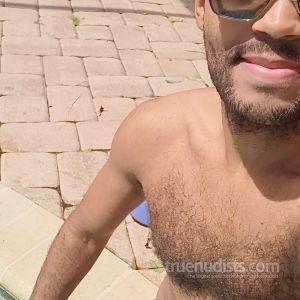Solo man sitting at home outside