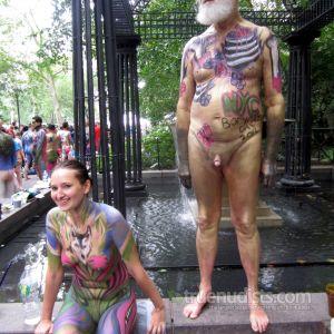A nude person wearing fun bodypaint outside