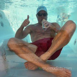 A man relaxing in the water