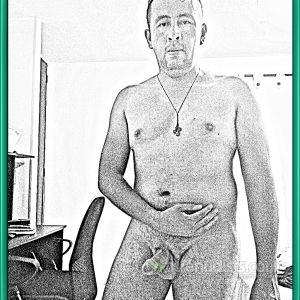 A dude posing in their house
