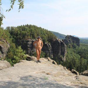 One dude walking in the woods