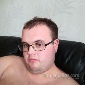 One nudist posing in their house