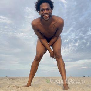 Solo nudist playing on the playa
