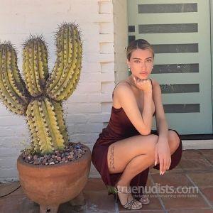A woman with cool tattoos outdoors
