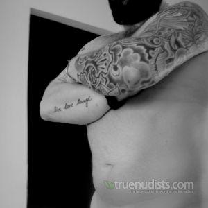 One guy with cool tattoos