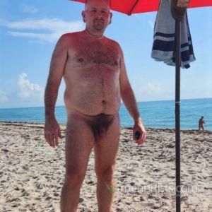 A male playing on the playa
