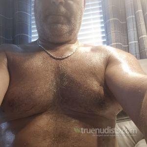 A nudist at their house