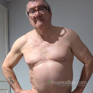 Solo male posing in their house