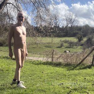 One nudist outside